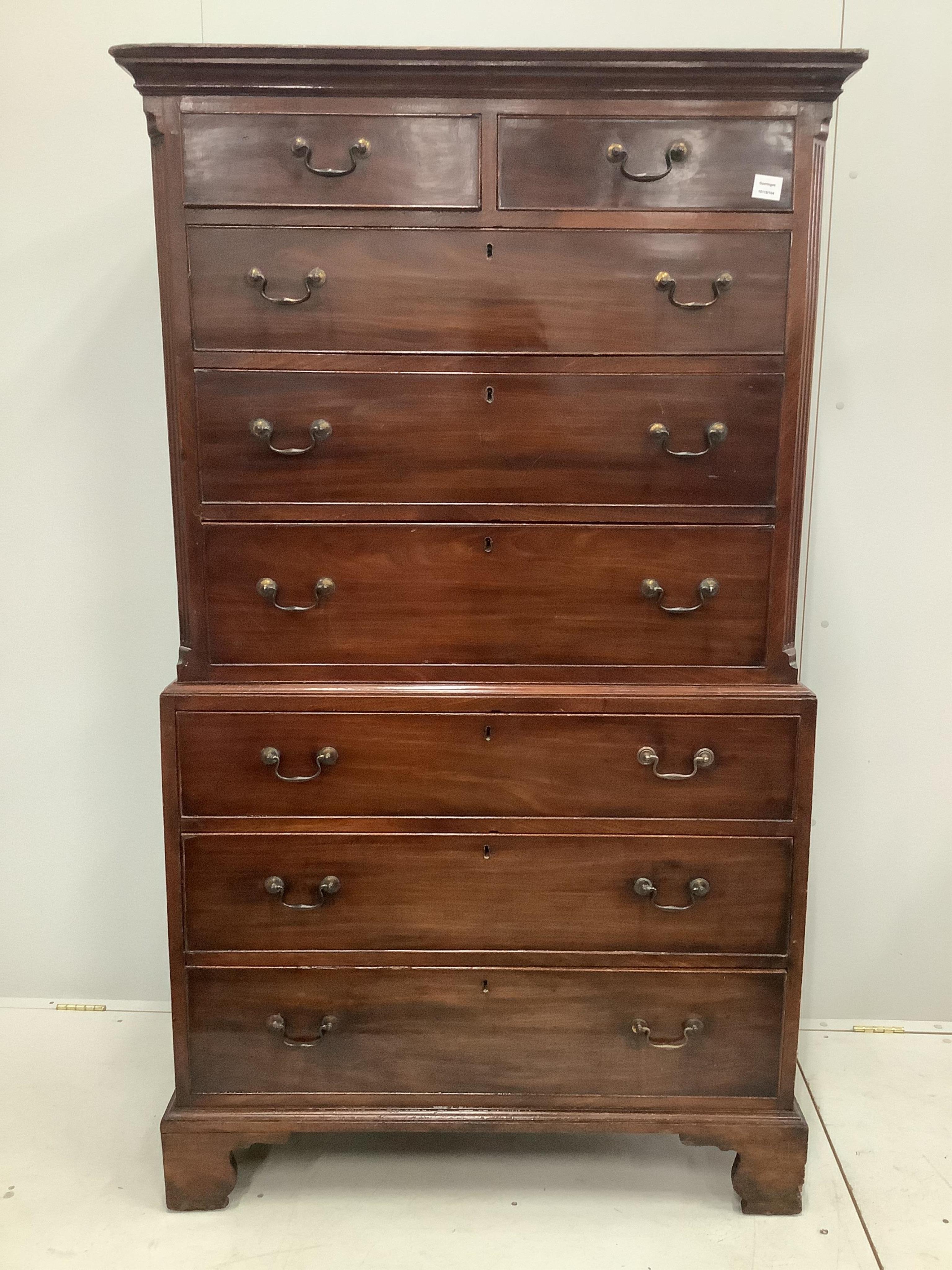 A George III mahogany chest on chest, width 104cm, depth 55cm, height 181cm. Condition - good